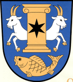 Erb Kozomín