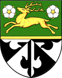 Erb — Kožušany-Tážaly